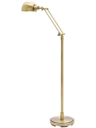 Addison Pharmacy-Style Adjustable Floor Lamp in Antique Brass.